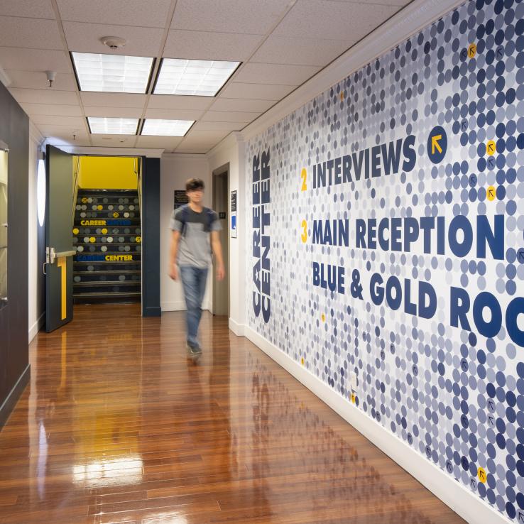 Interior entry corridor with branded wall graphics